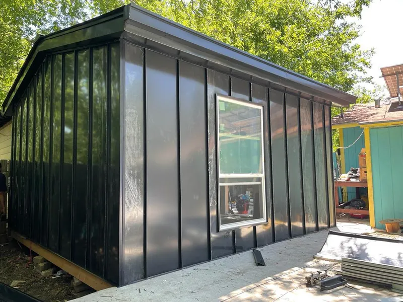 Black standing seam metal wall panels for Metal Roof Installation in Crystal