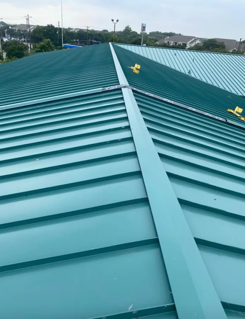 Green commercial metal roof ridge and valley for Metal Roof Repair in Crystal